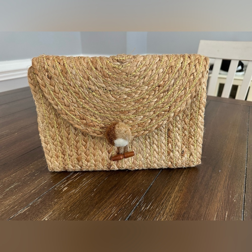 America & Beyond handwoven clutch